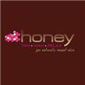 Honey Tan and Wax logo